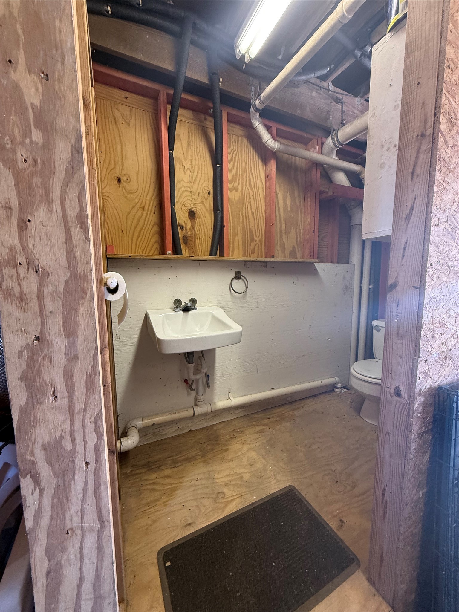 1118 County Road 204 Sargent, TX 77414 - Photo 31 of 36 a view of storage and utility room