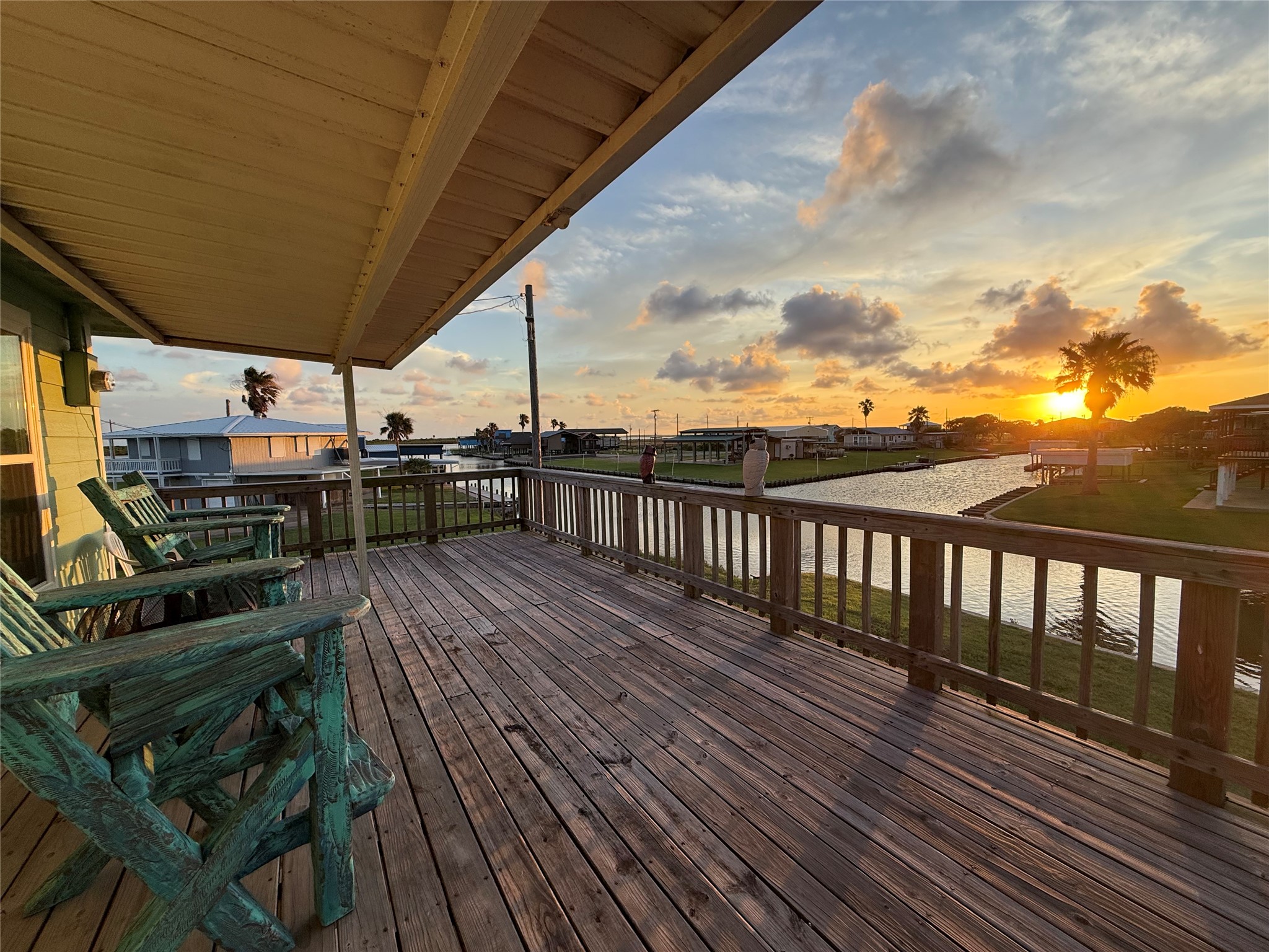 1118 County Road 204 Sargent, TX 77414 - Photo 5 of 36 a view of a balcony with wooden floor