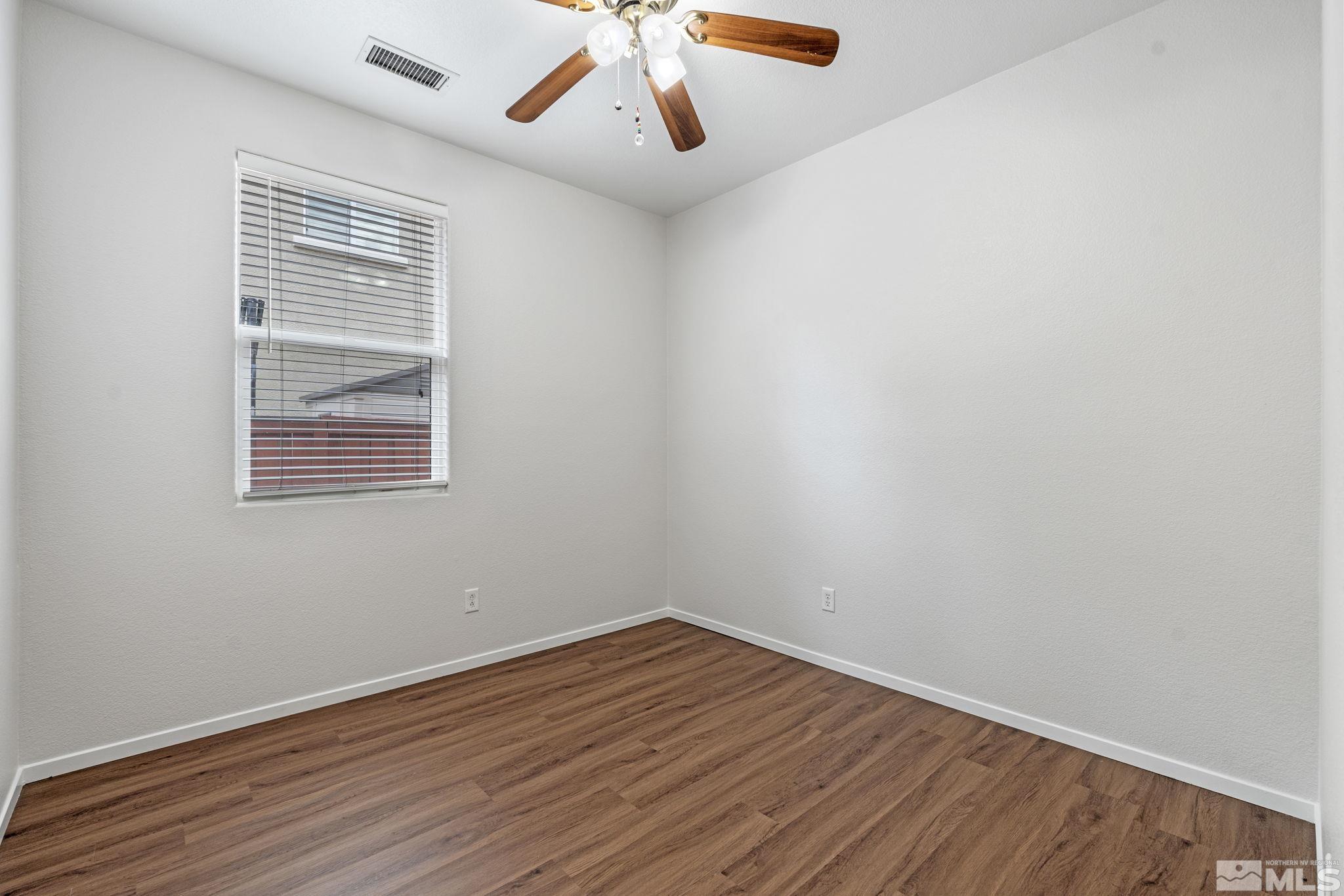 310 Pesaro Way Reno, NV 89521 - Photo 18 of 25 wooden floor in an empty room