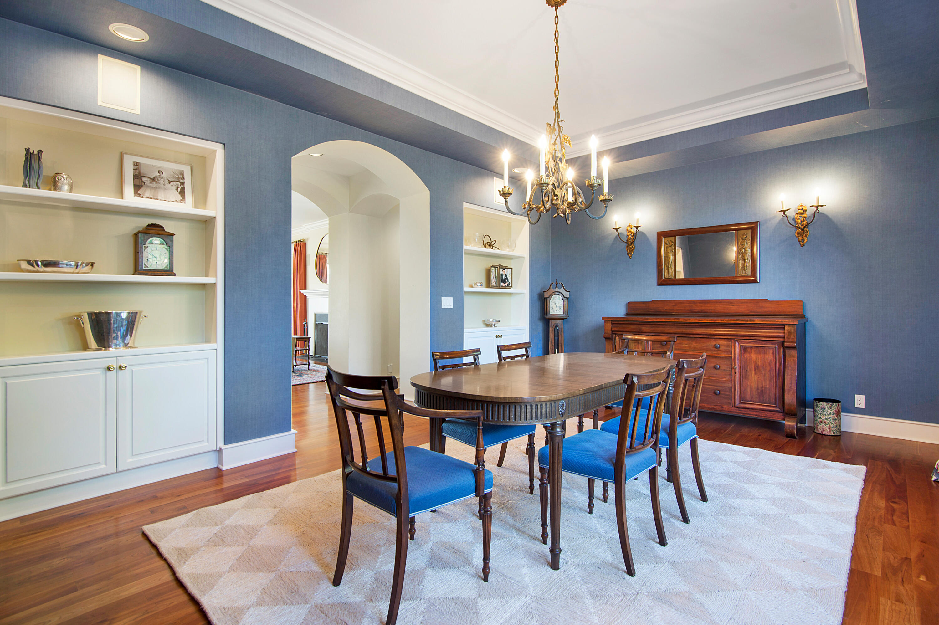 64950 Collins Road Bend, OR 97703 - Photo 29 of 87 a view of a dining room with furniture and wooden floor
