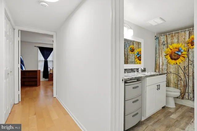 a kitchen with stainless steel appliances a stove and a refrigerator