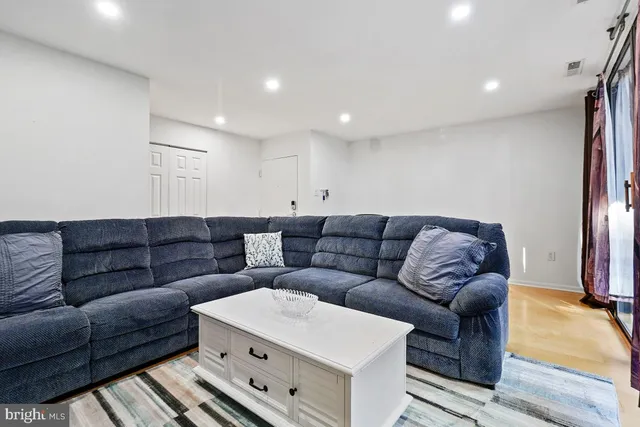 a living room with furniture and a couch