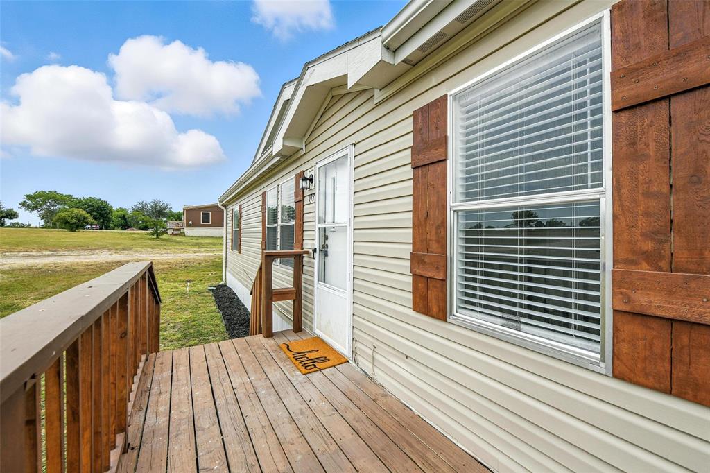 197 Pondview Drive Decatur, TX 76234 - Photo 2 of 28 a view of outdoor space and deck
