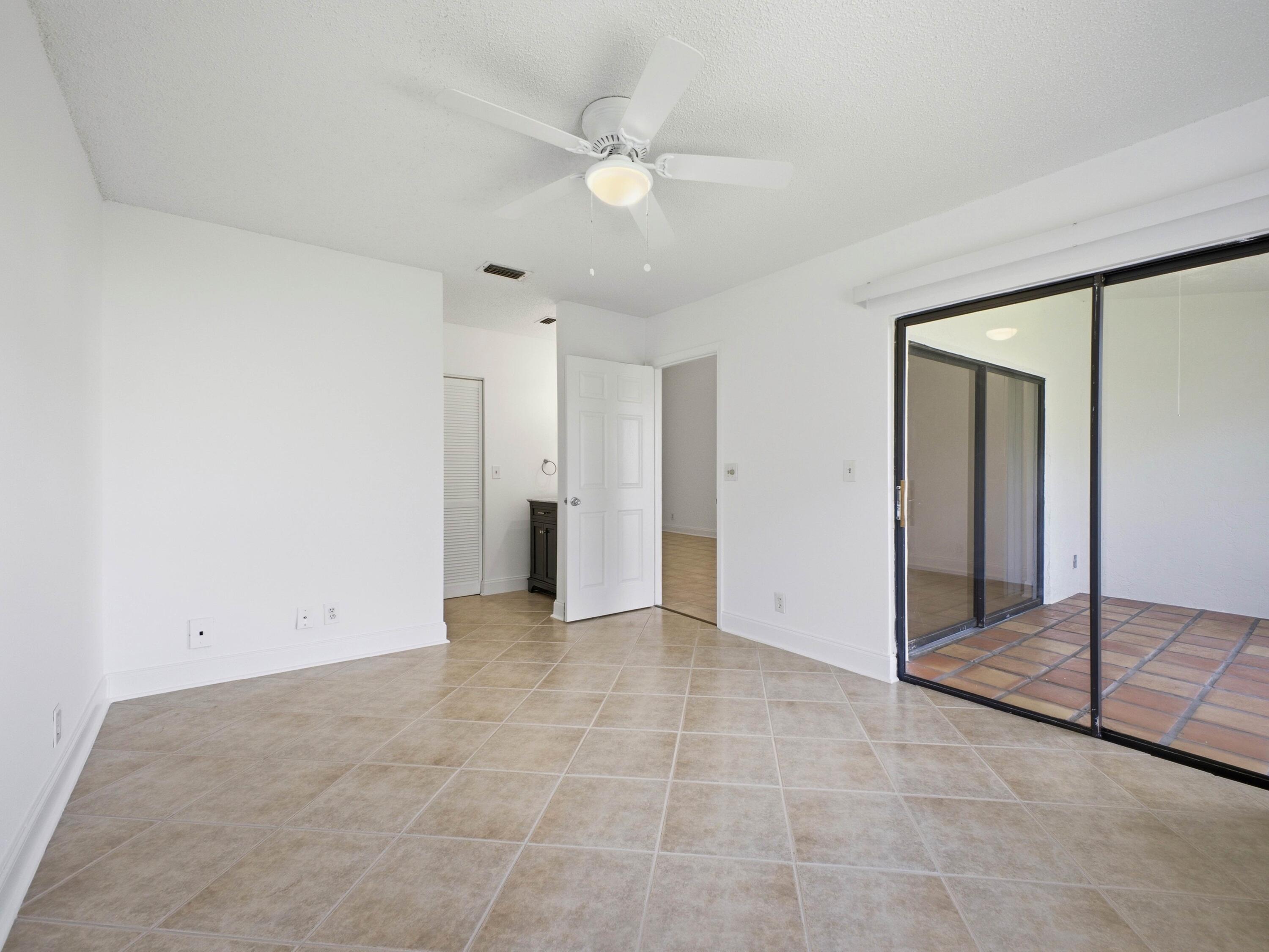 321 Norwood Terrace, Unit N221 Boca Raton, FL 33431 - Photo 27 of 36 Primary Bedroom