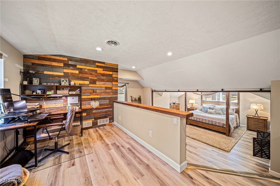 5411 Highland Road Cleveland, OH 44143 - Photo 20 of 46 Loft area off the owners' suite makes a great office, or can be nursery or dressing room area, shiplap wall adds great detail.
