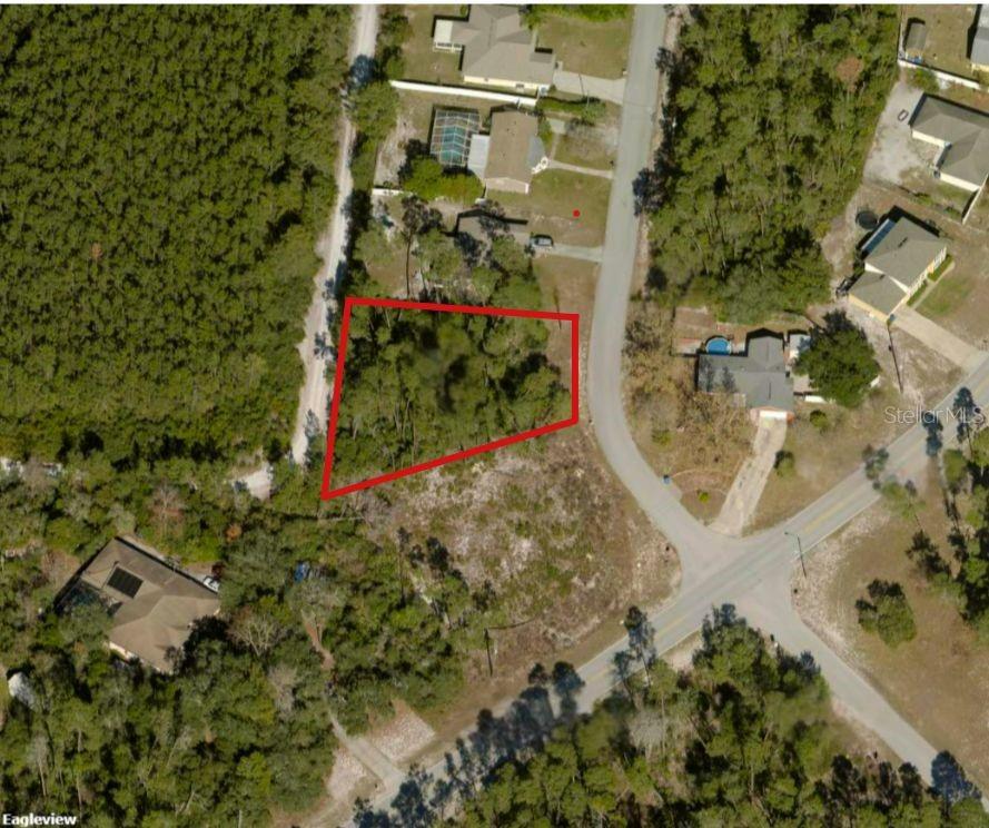 5417 Moongate Road Spring Hill, FL 34606 - Photo 3 of 4 a view of buildings