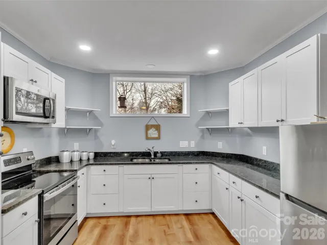 $900,000 | 303 East Forest Place, Unit 13, Candler, NC 28715