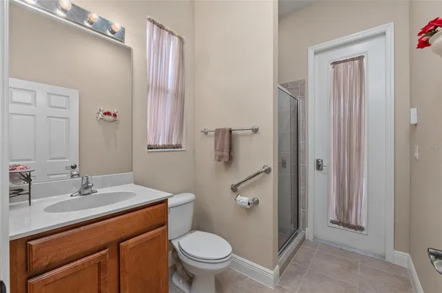 a view of swimming pool with a patio