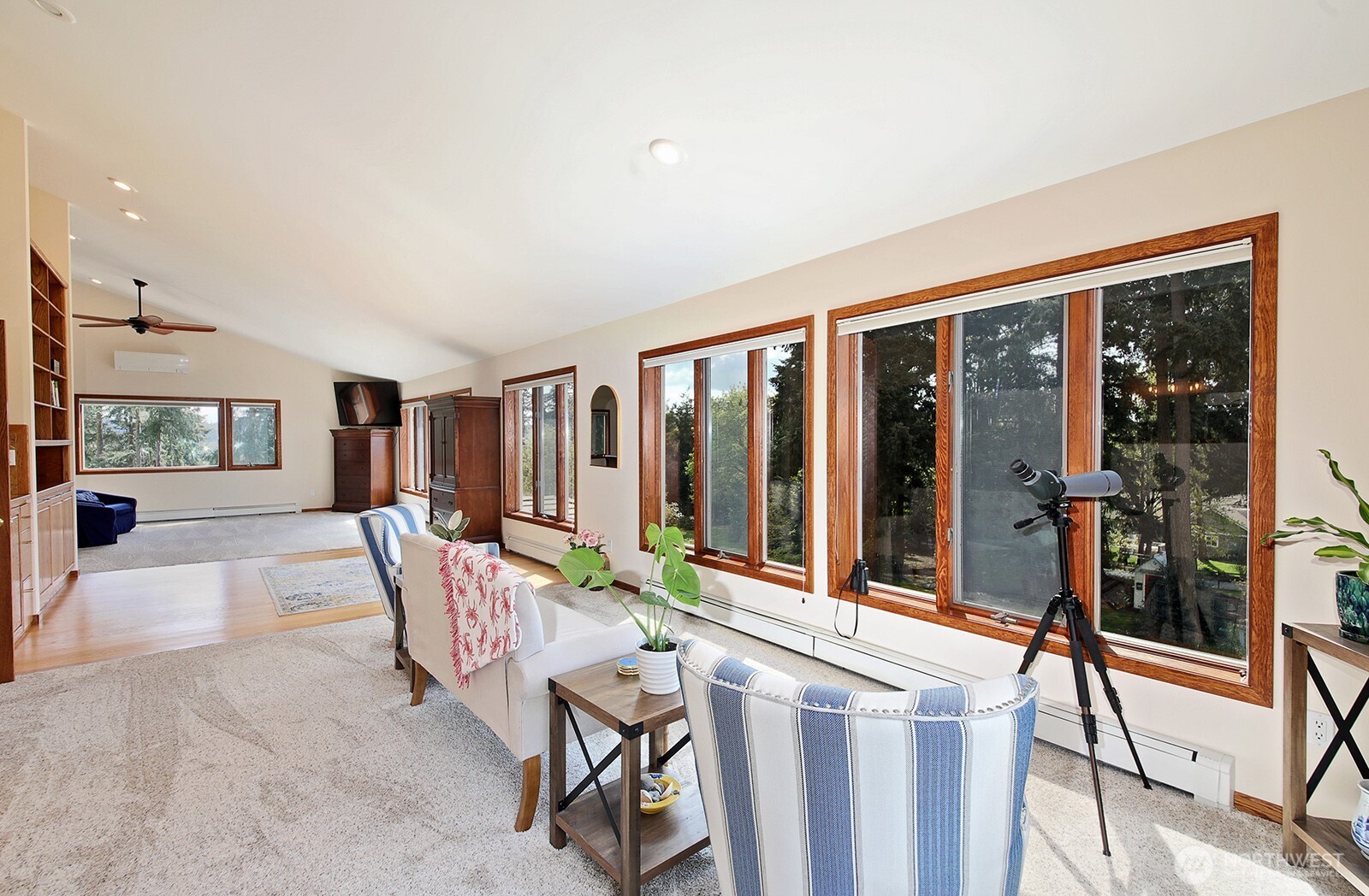 5741 Crow Haven Road Langley, WA 98260 - Photo 29 of 40 a living room with furniture and large windows