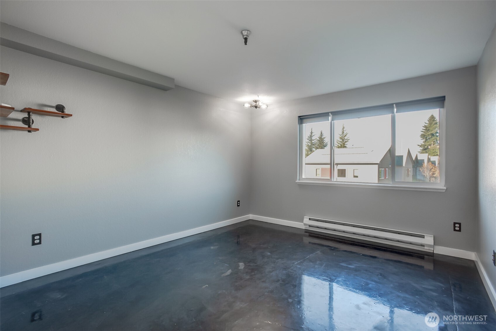 1100 Harrington Avenue Northeast, Unit 310 Renton, WA 98056 - Photo 15 of 26 an empty room with windows