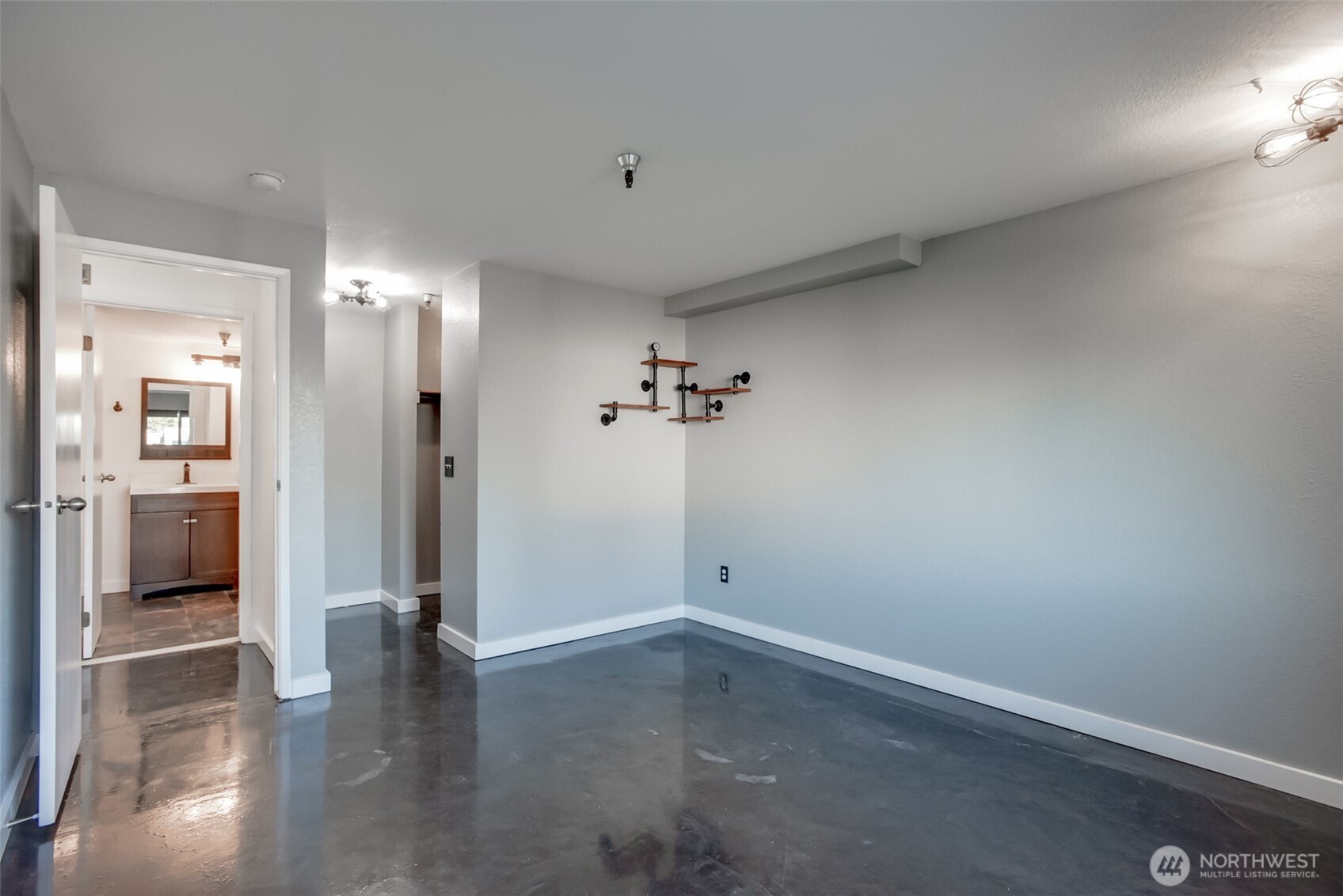 1100 Harrington Avenue Northeast, Unit 310 Renton, WA 98056 - Photo 16 of 26 wooden floor in an empty room