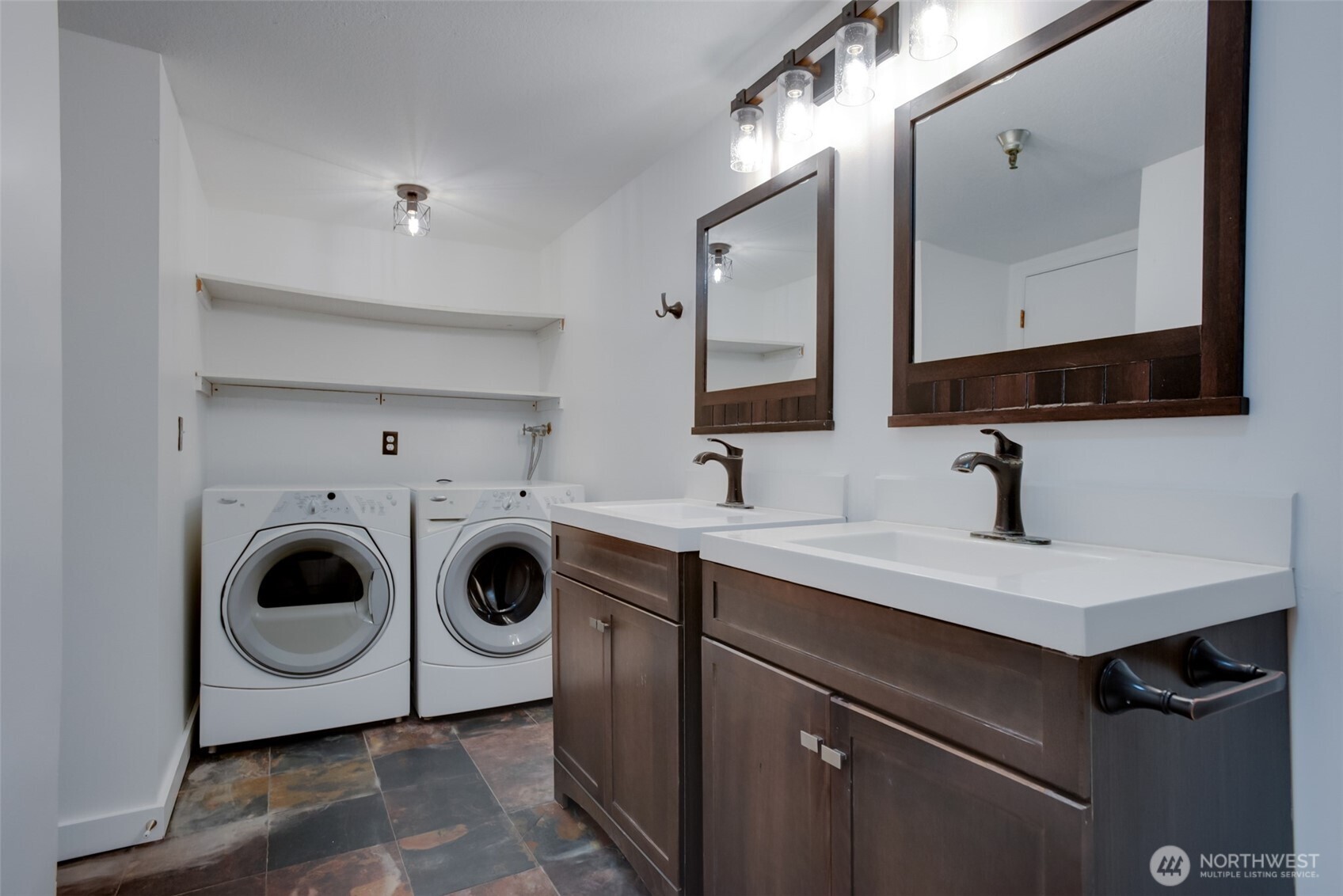 1100 Harrington Avenue Northeast, Unit 310 Renton, WA 98056 - Photo 20 of 26 a utility room with sink dryer and washer