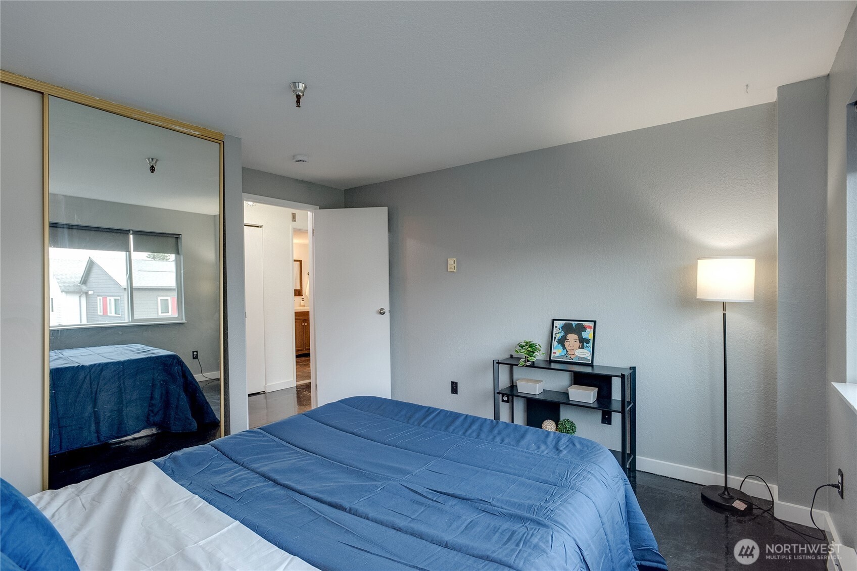 1100 Harrington Avenue Northeast, Unit 310 Renton, WA 98056 - Photo 26 of 40 a bed room with a bed and a window