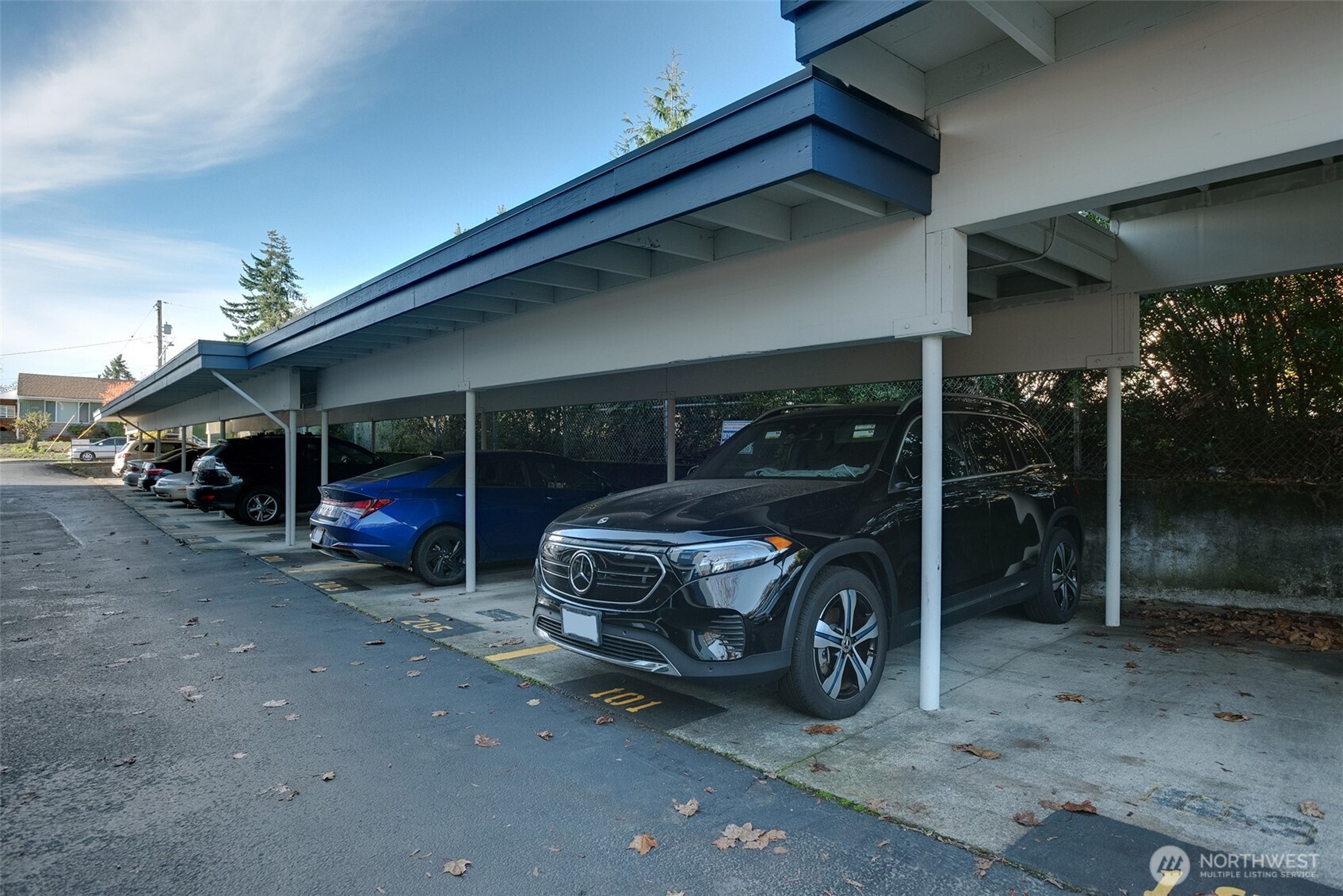 1100 Harrington Avenue Northeast, Unit 310 Renton, WA 98056 - Photo 26 of 26 a car parked in front of house