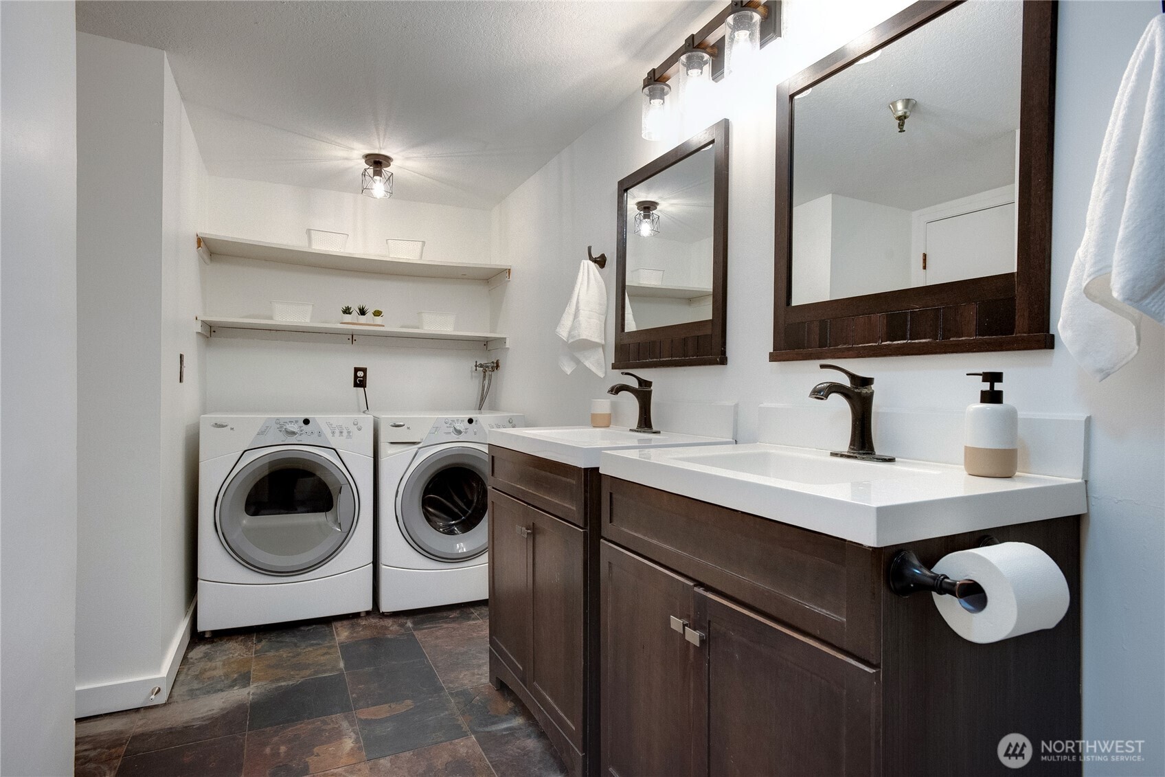 1100 Harrington Avenue Northeast, Unit 310 Renton, WA 98056 - Photo 29 of 40 a utility room with sink dryer and washer