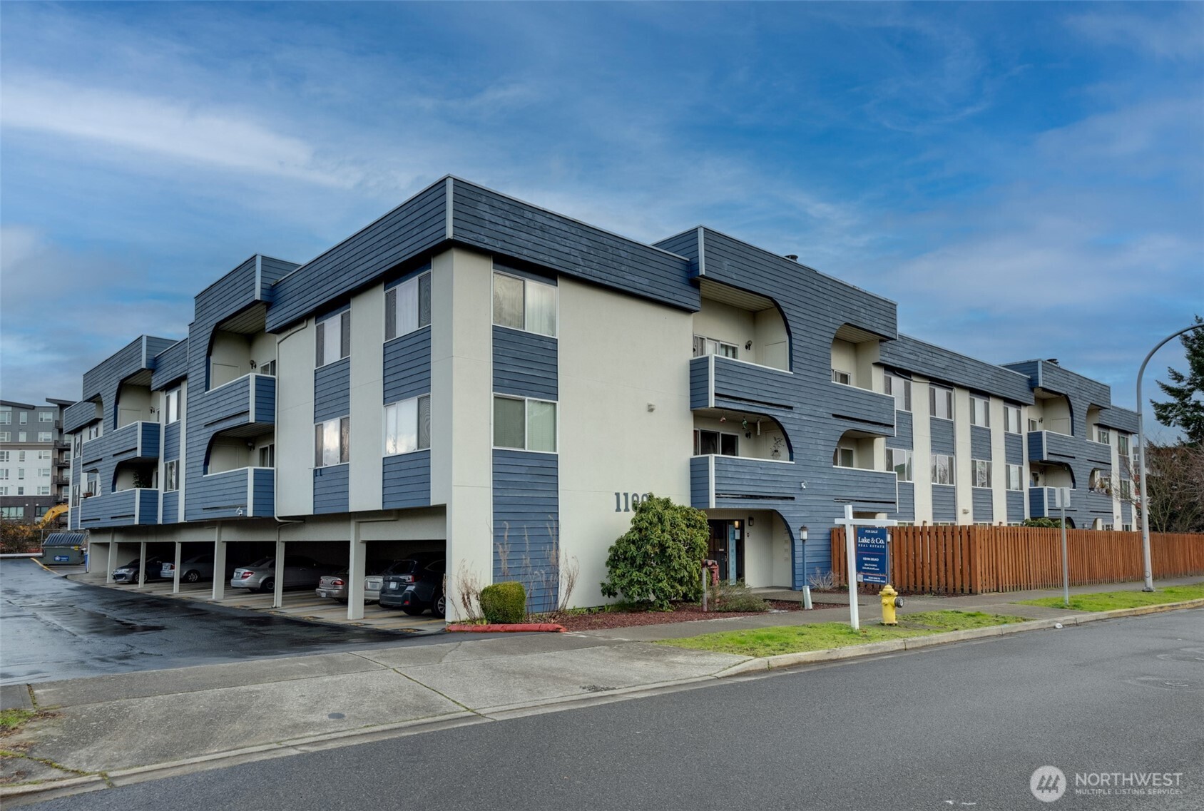 1100 Harrington Avenue Northeast, Unit 310 Renton, WA 98056 - Photo 35 of 40 a view of a building with a street