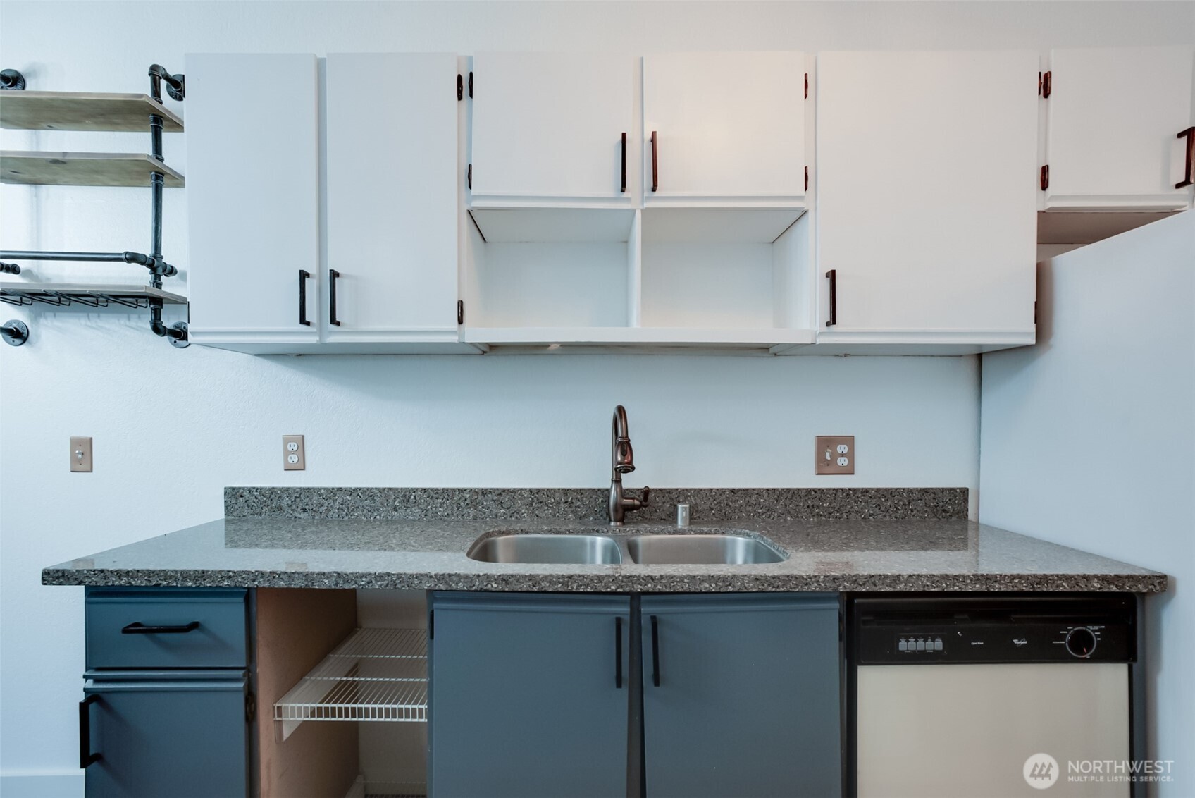 1100 Harrington Avenue Northeast, Unit 310 Renton, WA 98056 - Photo 6 of 26 a kitchen with stainless steel appliances granite countertop a sink and a cabinets