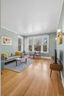 a living room with furniture and a table