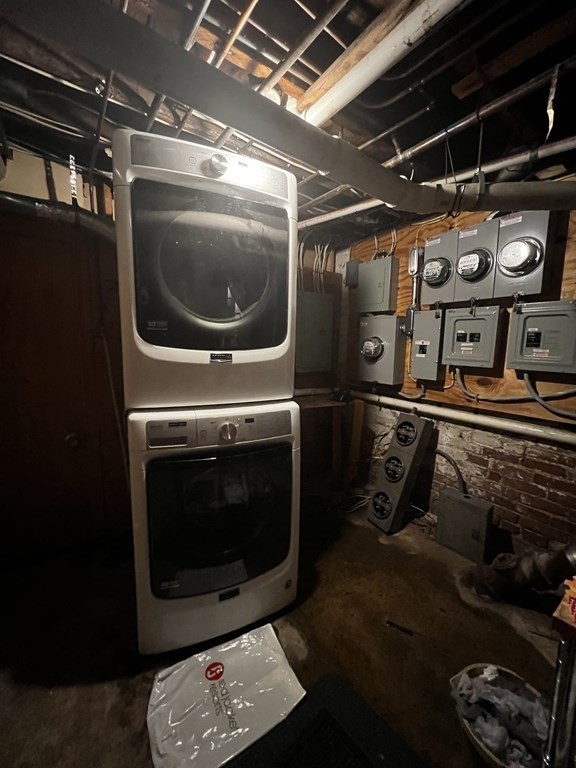 40-42 Winter Street, Unit 3 Boston, MA 02111 - Photo 12 of 12 a utility room with furniture dryer and washer