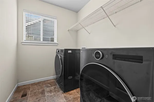 a view of utility room with washer and dryer