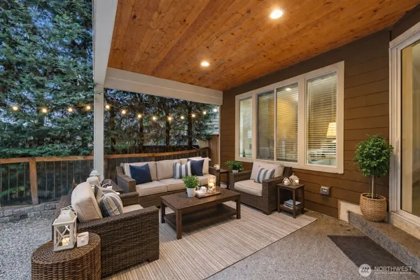 a outdoor living space with furniture and garden view