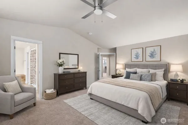 a spacious bedroom with a bed and furniture