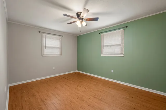 wooden floor and window in a room