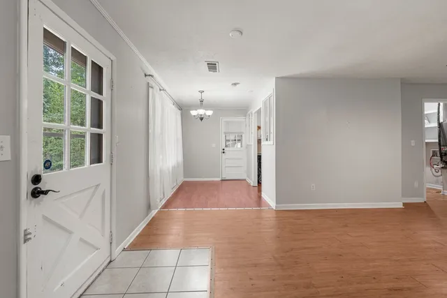a view of a hallway with closet