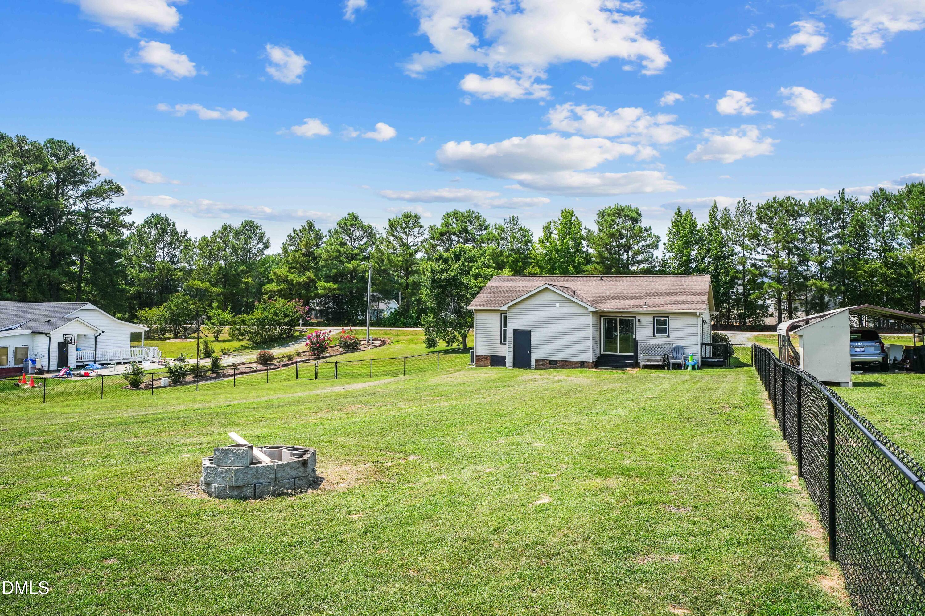 101 Stephenson Road Benson, NC 27504 - Photo 23 of 29 a front view of a house with garden