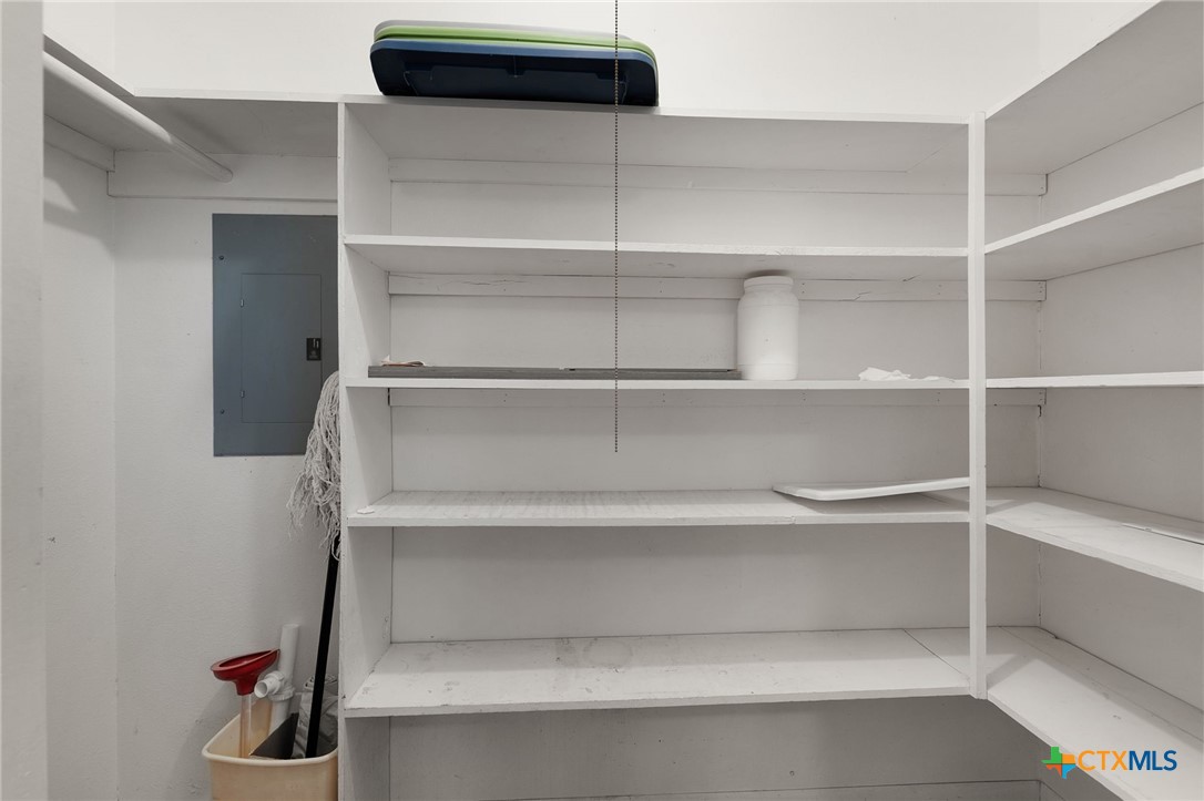 1830 Fm 221 Hamilton, TX 76531 - Photo 12 of 45 a view of walk in closet with empty racks