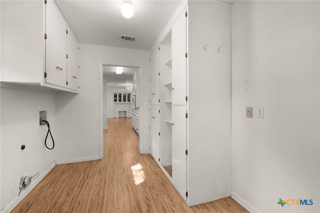 1830 Fm 221 Hamilton, TX 76531 - Photo 13 of 45 a view of livingroom with hardwood