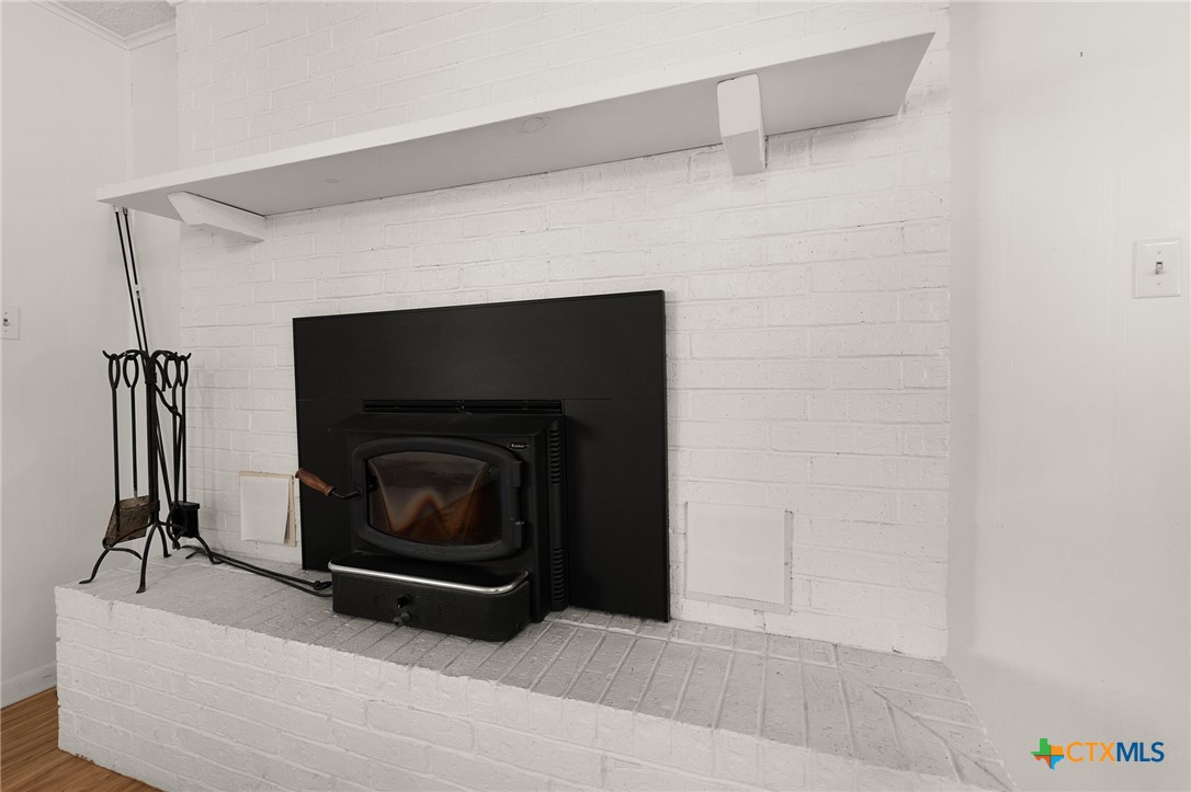 1830 Fm 221 Hamilton, TX 76531 - Photo 7 of 45 a living room with a fireplace