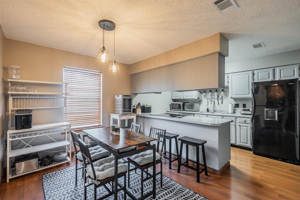 655 Ridgeline Drive Hurst, TX 76053 - Photo 2 of 29 Spacious dining area with a breakfast bar