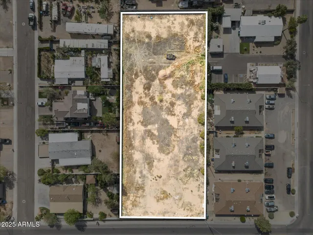 an aerial view of residential building with outdoor space