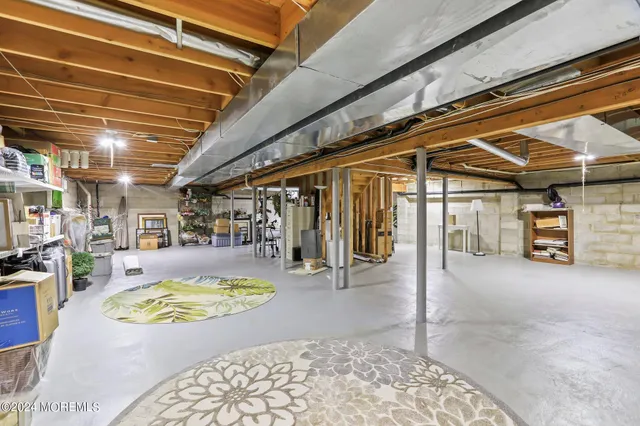 a kitchen with stainless steel appliances granite countertop a stove a refrigerator and a sink