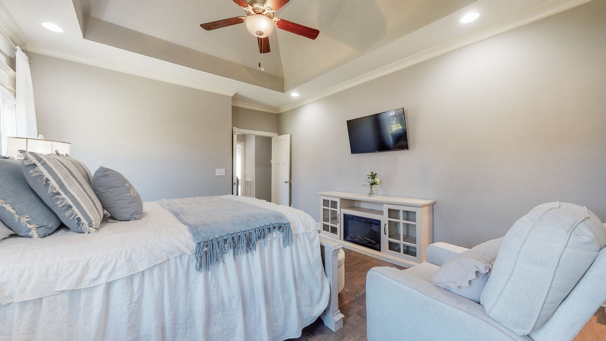 262 Ridgewater Way Mount Juliet, TN 37122 - Photo 21 of 58 a bedroom with a bed and a flat screen tv