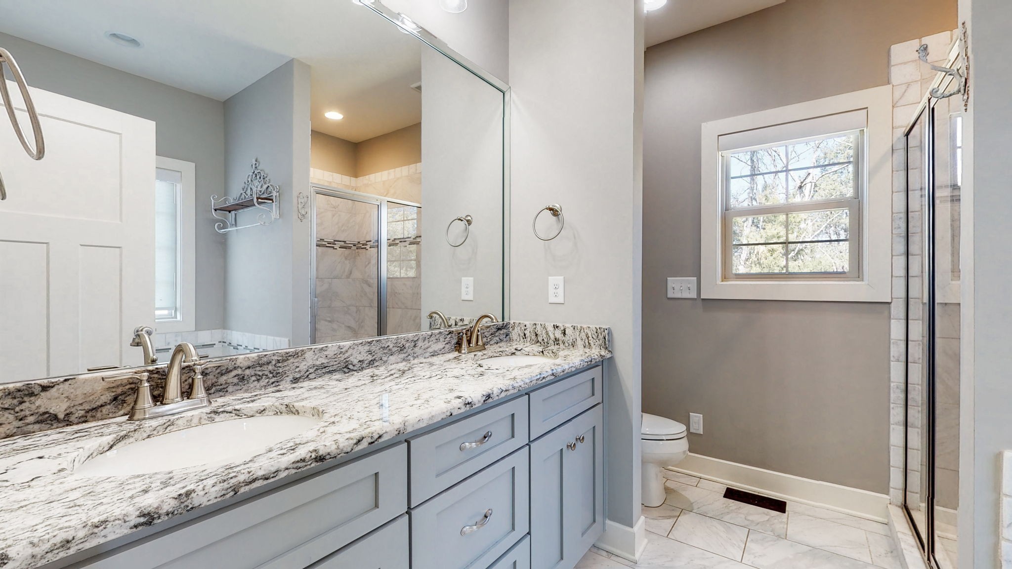 262 Ridgewater Way Mount Juliet, TN 37122 - Photo 22 of 58 a bathroom with a granite countertop sink toilet and shower