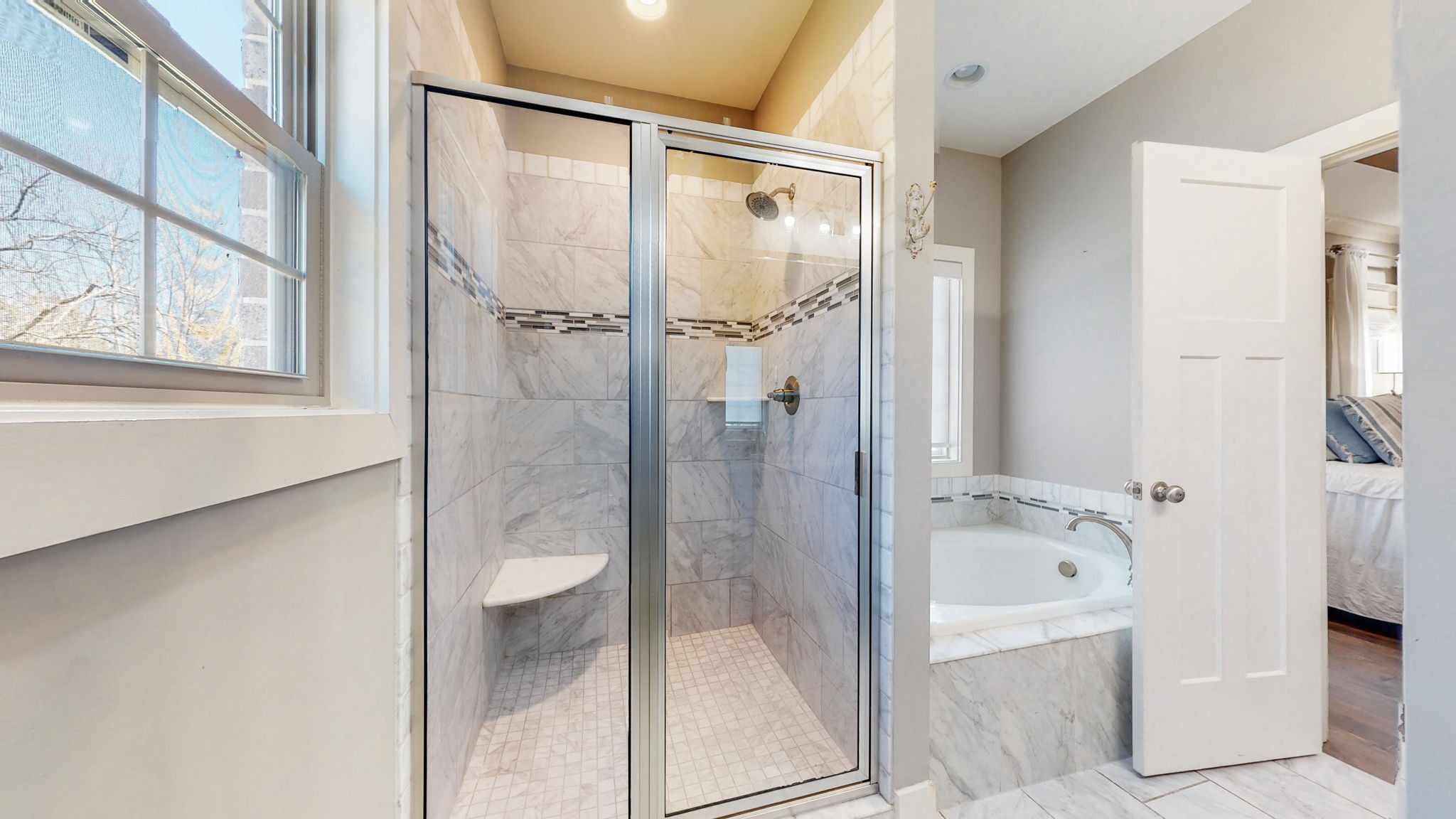 262 Ridgewater Way Mount Juliet, TN 37122 - Photo 23 of 58 a bathroom with a bathtub and a shower
