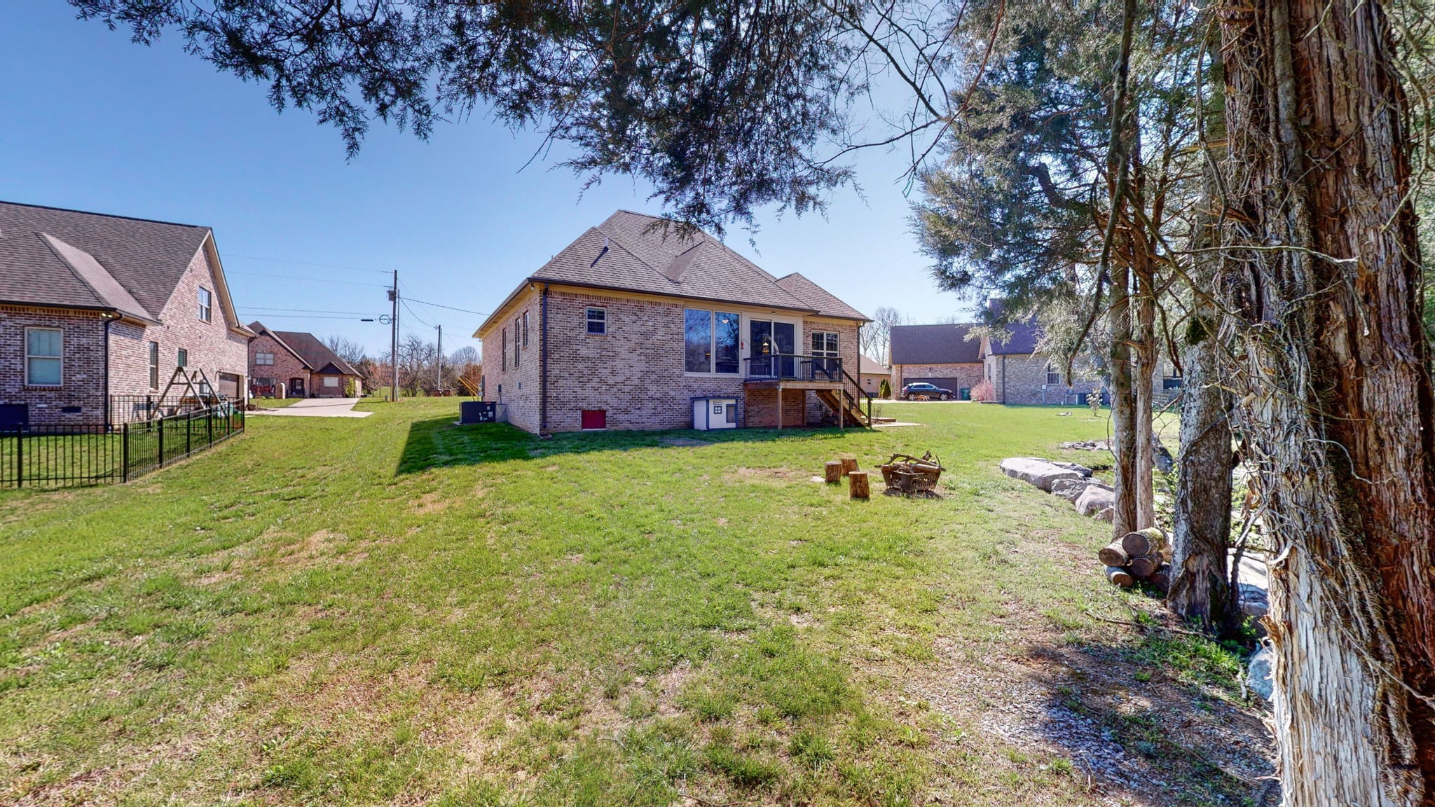 262 Ridgewater Way Mount Juliet, TN 37122 - Photo 46 of 58 a view of a big house with a big yard and large tree