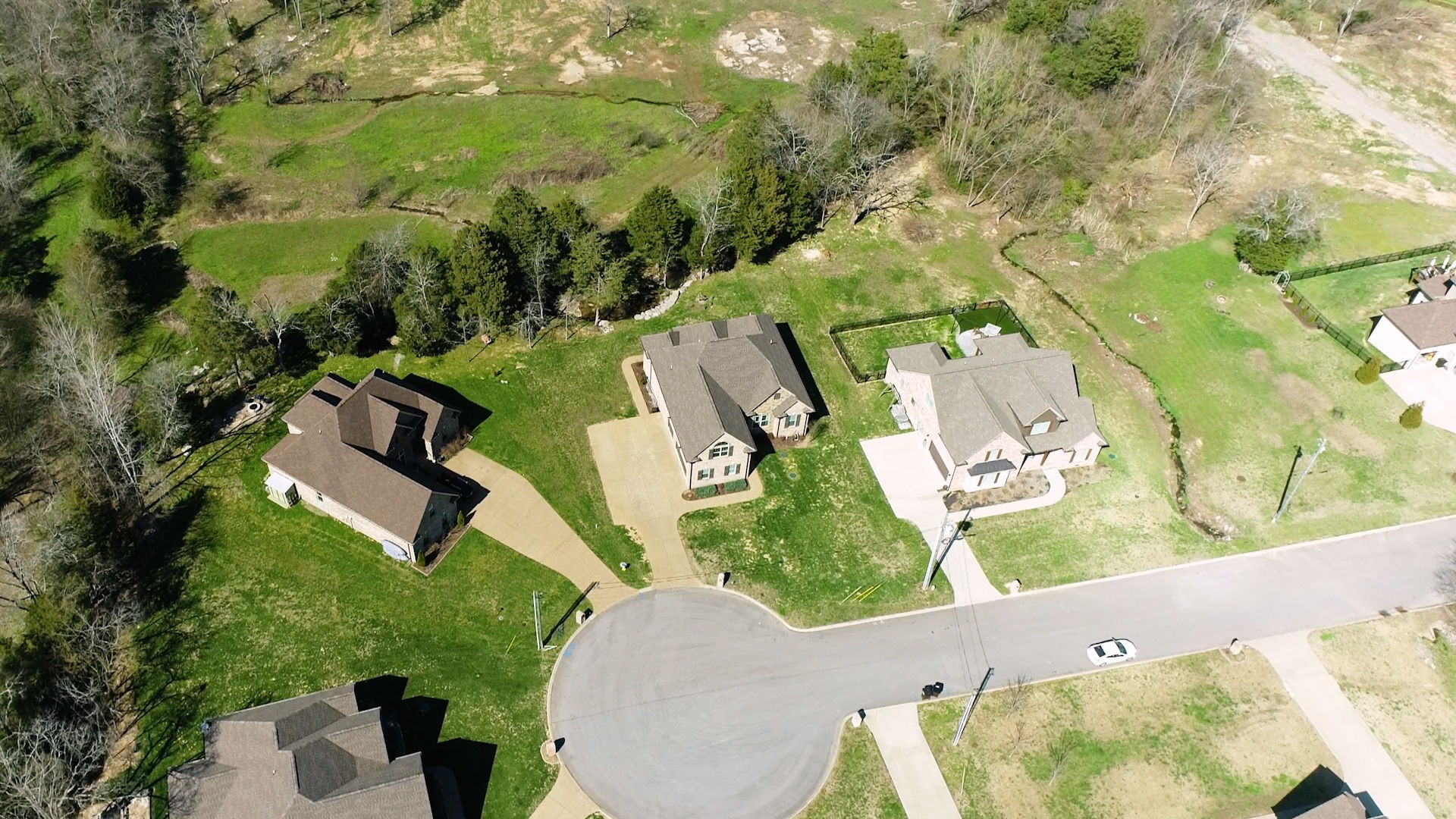 262 Ridgewater Way Mount Juliet, TN 37122 - Photo 56 of 58 an aerial view of a house with a yard and pool