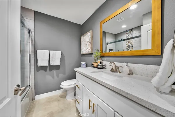 a bathroom with a sink and a toilet