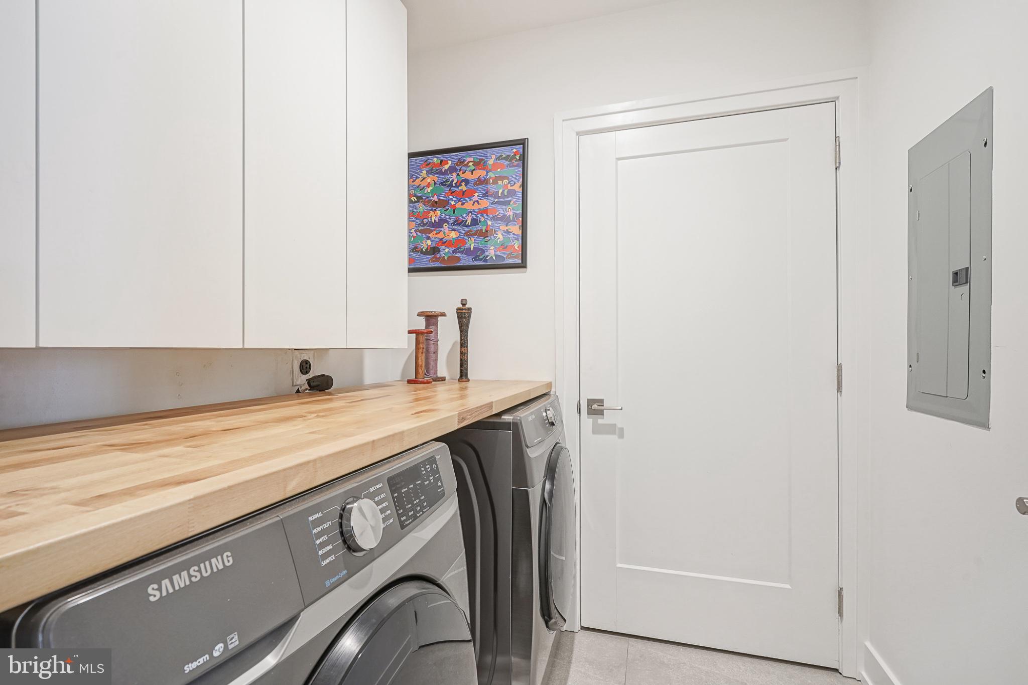 622 South Clarion Street Philadelphia, PA 19147 - Photo 28 of 57 Modern laundry space with sleek design.