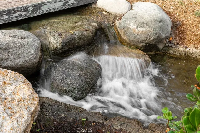 a view of swimming pool from a lake view