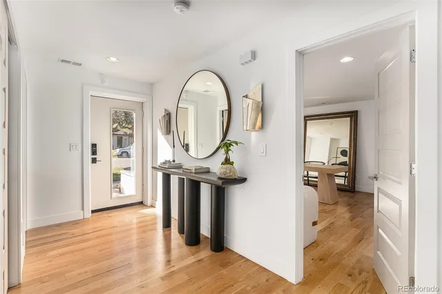 a view of a livingroom from a hallway