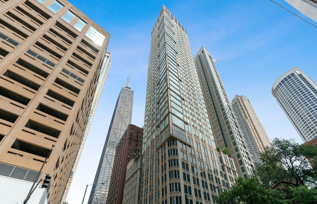 57 East Delaware Place, Unit 1801 Chicago, IL 60611 - Photo 1 of 19 a view of a large building with wooden floor