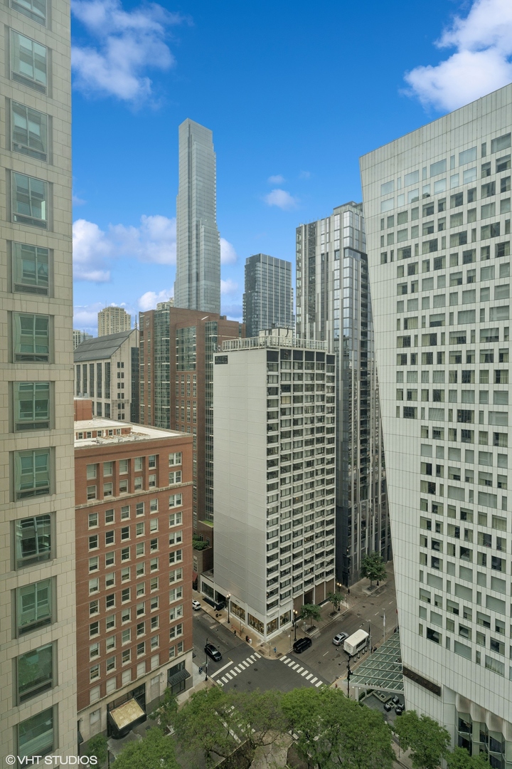 57 East Delaware Place, Unit 1801 Chicago, IL 60611 - Photo 12 of 19 a view of a city with tall buildings