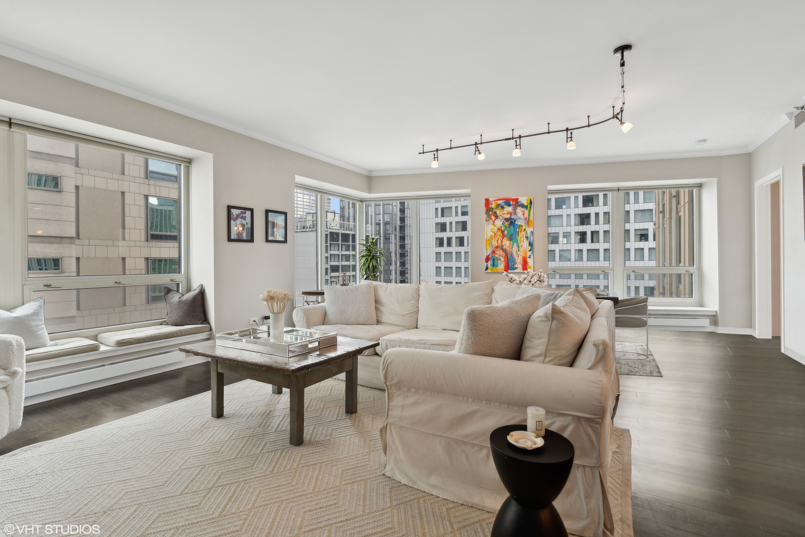 57 East Delaware Place, Unit 1801 Chicago, IL 60611 - Photo 2 of 19 a living room with furniture and wooden floor