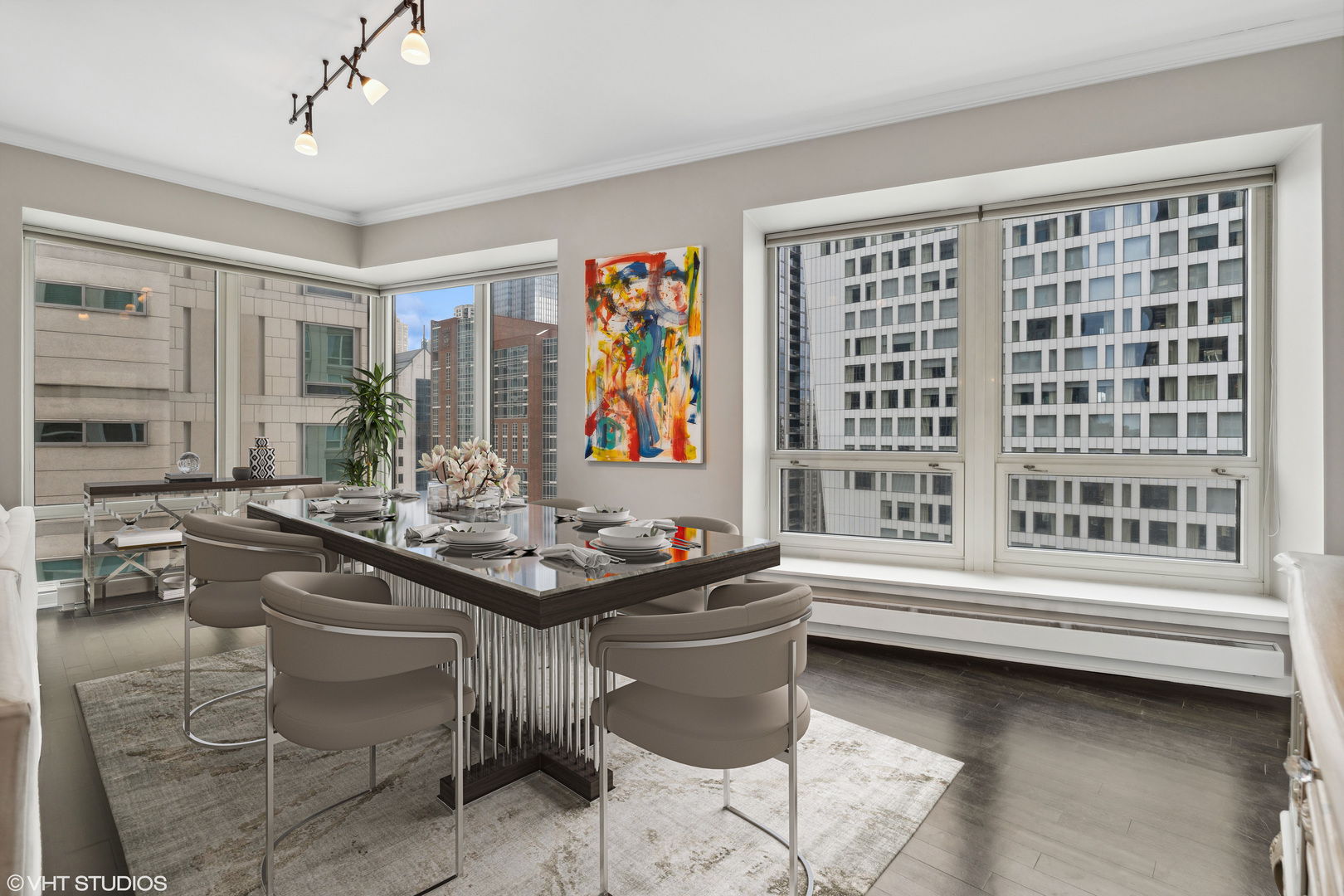 57 East Delaware Place, Unit 1801 Chicago, IL 60611 - Photo 4 of 19 a dining room with a table and chairs