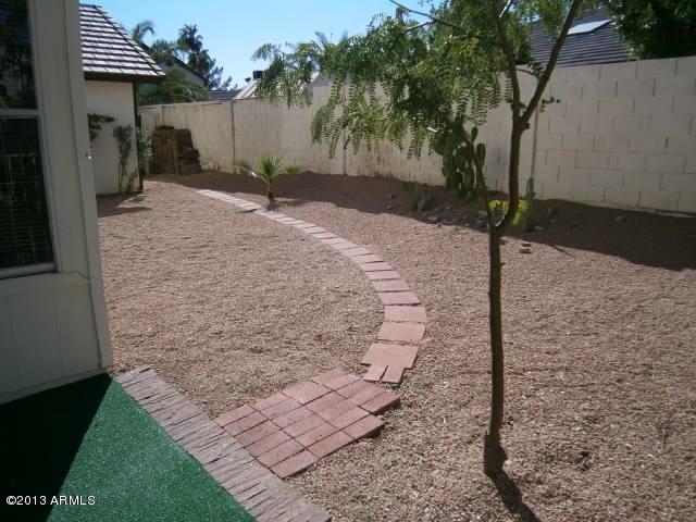 4556 East Corral Road Phoenix, AZ 85044 - Photo 33 of 37 Side yard brick walkway
