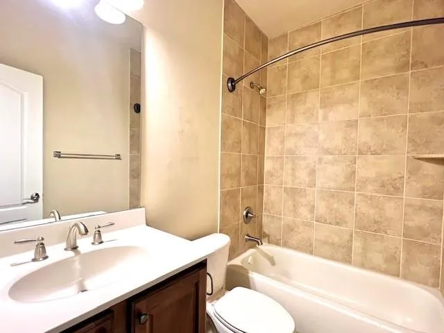a bathroom with a sink and toilet